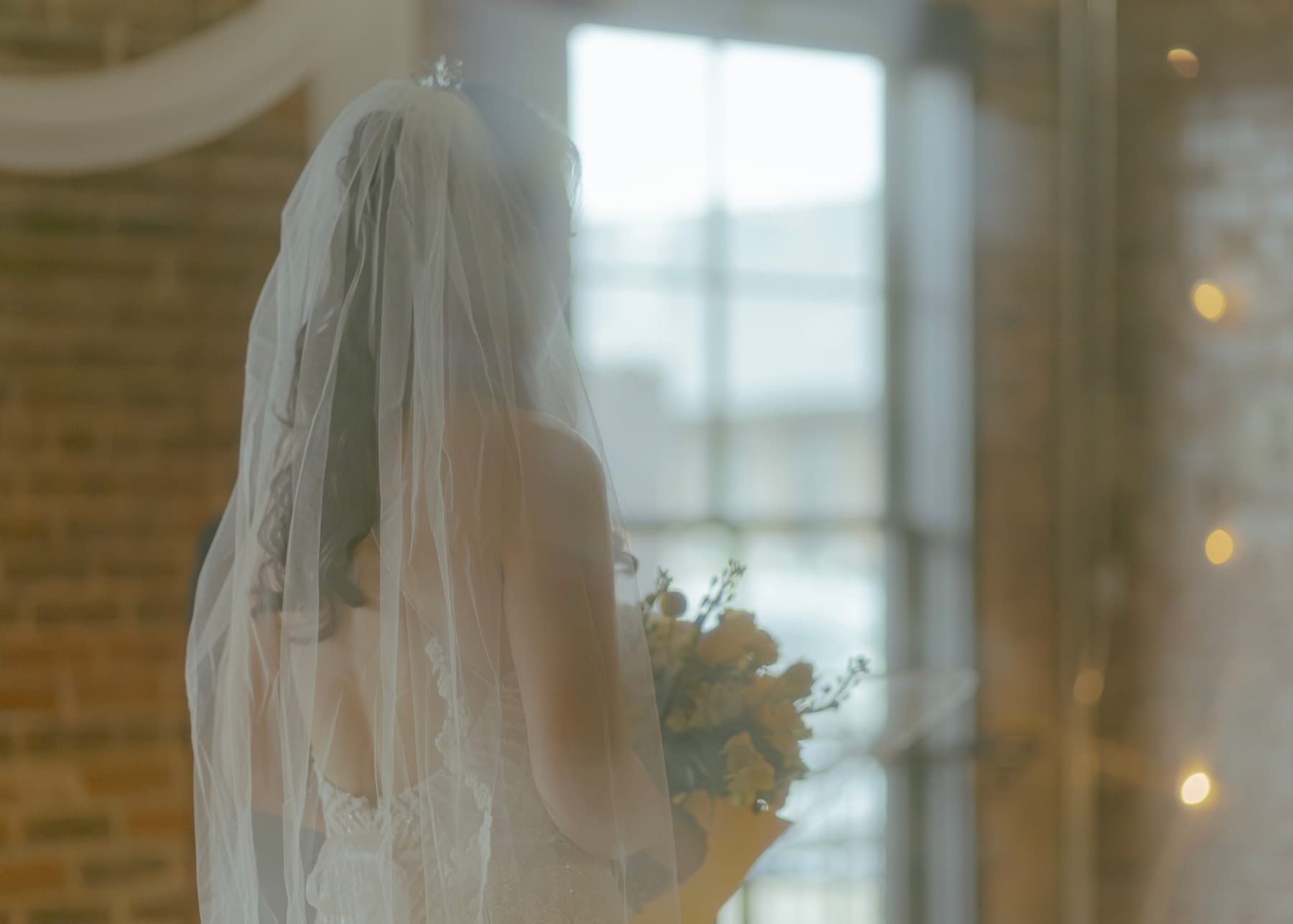 Bride's veil in the window light