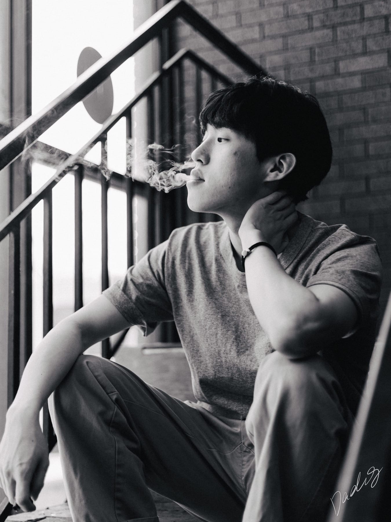 Black-and-white portrait on a stairwell